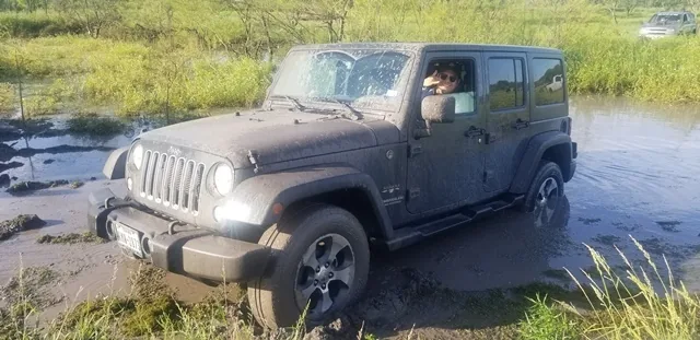 Jeep in mud pit at 281 Country Club San Antonio offroad park